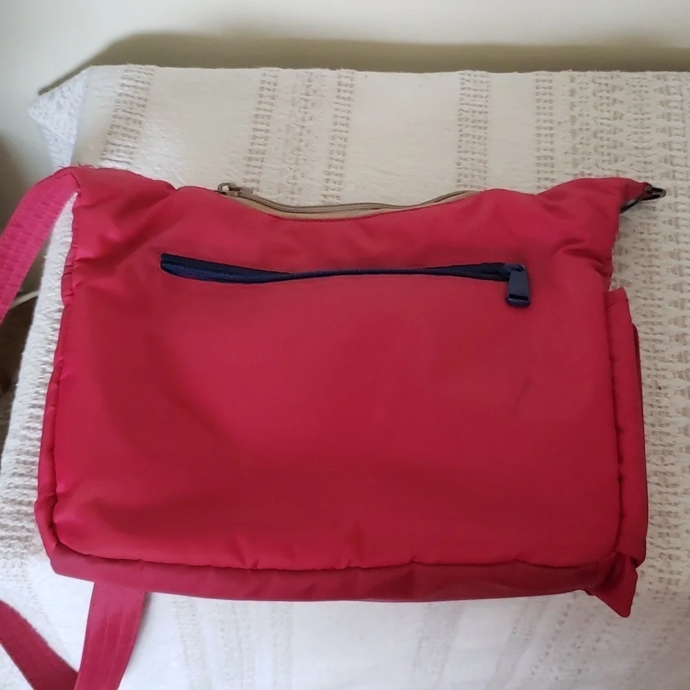 Lug 'swing' crossbody bag, hot pink, 3 sectioned pockets.